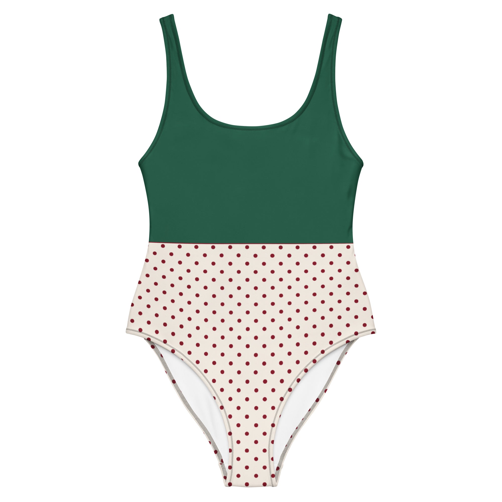 Einteiler Badeanzug "Forest Dots". Oben Waldgrün, unten cremeweiß mit roten Punkten im Color-Block-Schnitt
