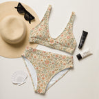 Cremefarbener High Waist Bikini mit zartem Blumenmuster in Salbeigrün und Rosatönen.