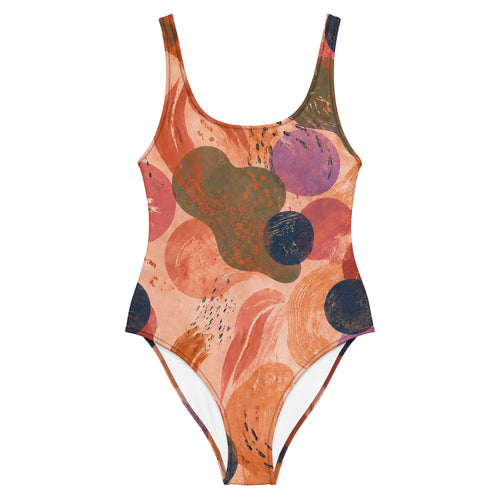 Einteiler Badeanzug Artistic Flow mit abstraktem Kunstmuster in Terrakotta, Rosa, Olivgrün und Navy auf Pfirsich-Grund.