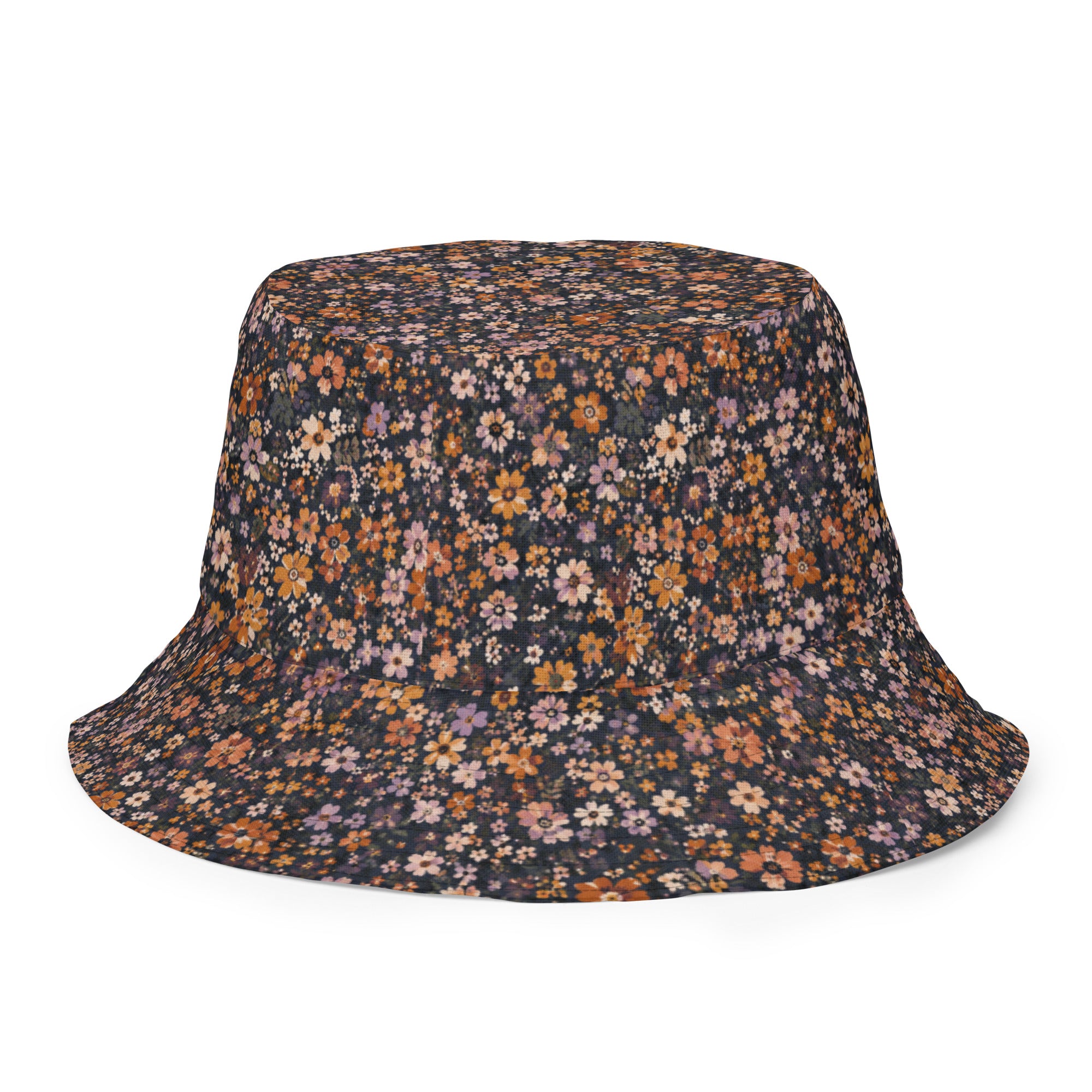 Wendbarer Bucket Hat Midnight Bloom von jenniabroad mit floralem Blumenmuster und dunkelblauer Seite für Strand, Urlaub und sonnige Tage.