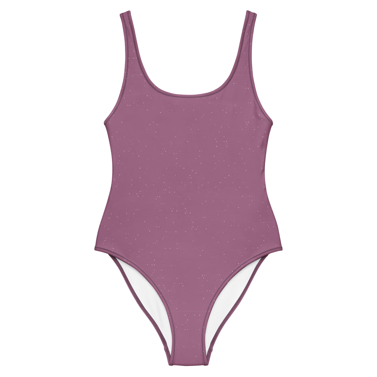 Mauvefarbener Damenbadeanzug Mauve Stardust mit Rundhalsausschnitt, breiten Trägern und dezenten Glitzerakzenten, präsentiert vor türkisblauem Meer und einer mediterranen Steinterrasse mit roten Rosen.